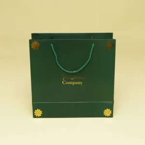 Custom Luxury Art Paper Costume Bag With Gold Foil Logo Ribbon Handle For Recyclable Shopping Gift Clothing Garment Packaging