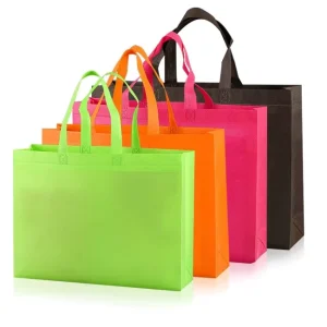 DLBZ Custom Logo Printed Multi size Non Woven Bag Multicolored Reinforced X stitch Handle Durable Reusable Shopping Tote