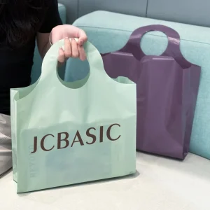 Eco Friendly Recyclable Plastic Punch Hole Garment Bags Custom Clothing Cover Bags Retail Shopping Bags Packaging Supplier Bulk