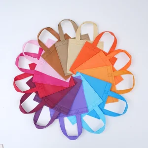 High Quality Disposable Non Woven Candy Bags Solid Color Tote Bags Custom Logo Screen Printed Supermarket Shopping Gift Bags