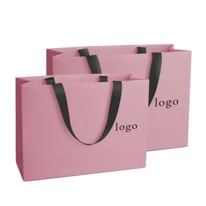 Luxury Custom Your Own logo Shopping Paper Bag for Clothes pink Matte Clothing Boutique Packaging Bags with Ribbon Handles