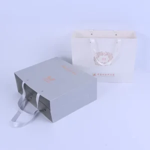 Luxury white Gift Paper Bag Custom Printed Logo for Shoes Clothes Shopping Wedding Gift Jewelry Packaging With Ribbon Handles