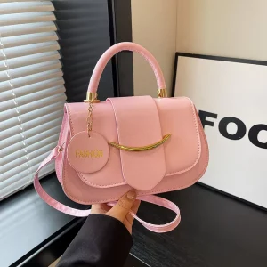 New Fashion Women’s Saddle Bag with Cute Pendant Luxury PU Leather Small Shoulder Crossbody Bag Minimalist Designer for Ladies