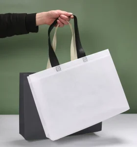 Premium Ultrasonic Non Woven Bag Stylish Bi Color Handle Reusable Gift Bag Recyclable Packing Tote for Advertising